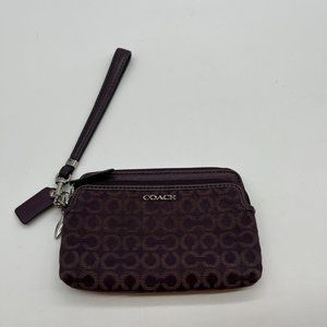 34. Coach Purple Canvas and Leather Signature Zip Top Wristlet